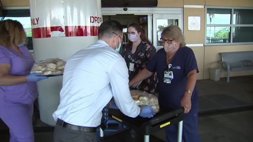 doctor feeding workers